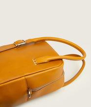 Load image into Gallery viewer, GUT OGGAU x SAGAN Vienna bag white I white I view from top I showing the bag lying on the back, showing belt detail and watoji detail I white background