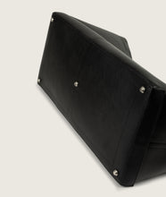 Load image into Gallery viewer, RT_XL Reinstote XL in black color, downside, showing the bottom studs. The bag is lying on the side on white display.