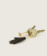Load image into Gallery viewer, Accessories I Carl Auböck x SAGAN Vienna keychain hand I white background